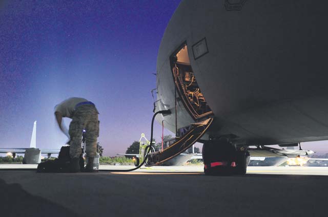 Photo by Senior Airman Timothy MooreAirman 1st Class Jerraine Griffin, 86th Aircraft Maintenance Squadron crew chief, secures his equipment before leaving the flightline. Airmen from the 86th AMXS work around the clock to ensure the readiness of Ramstein’s aircraft. 