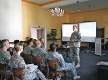 Col. Darren Werner, commander of 16th Sustainment Brigade, 21st Theater Sustainment Command, leads a discussion about team building during a command team training event held at the Rheinlander Club Sept 6.