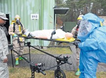 Medical Soldiers learn to treat casualties in a chemical, biological environment