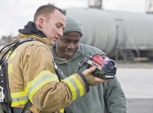 Staff Sgt. David Lund, 86th Civil Engineer Squadron firefighter, shows Staff Sgt. Rudolph Richards, 86th Airlift Wing chaplain assistant, a thermal imaging camera Dec. 6 on Ramstein. Richards spent the majority of his day talking with Airmen from various units to learn about their career and raise morale.