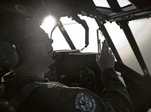 Photo by Senior Airman Jonathan StefankoCapt. Michael Trimble, 37th Airlift Squadron chief of scheduling, helps the pilot maintain visual contact with the runway during a pilot proficiency sortie March 6 above Ramstein. These types of sorties help keep more than 70 37th AS pilots proficient in various takeoff, approach and landing maneuvers.