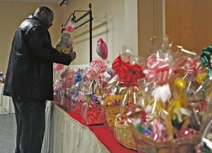 Tech. Sgt. Adrian Justice, 86th Material Maintenance Squadron NCO in charge of armament, looks at gift baskets at the Cupid’s Valentine Gift Shop