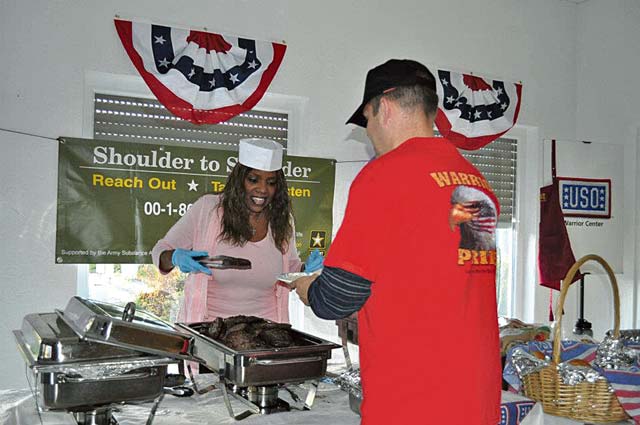 Courtesy photoGloria Gaynor serves supper to a Soldier during her visit to Landstuhl Regional Medical Center two years ago. Gaynor made a promise to return. She will sing and tell stories this Christmas at LRMC’s Heaton Hall.
