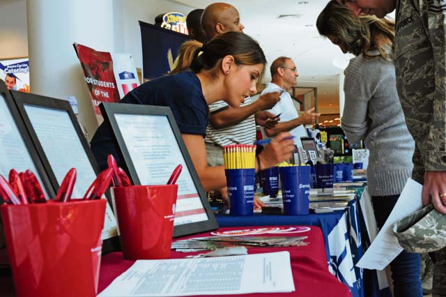 Photo by Staff Sgt. Travis EdwardsAcademic service counselors make themselves available during the education fair held Aug. 16 at the Kaisers- lautern Military Community Center on Ramstein. The fair hosted many different military-friendly colleges offered through the Ramstein Education Center to help answer some of the frequently asked questions from KMC  members in the area.