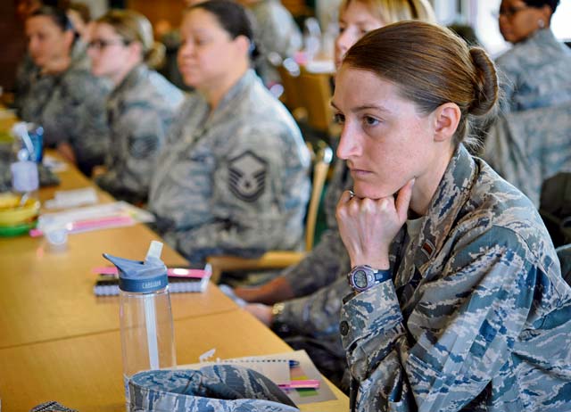 Second Lt. Magin Day, U.S. Air Forces in Europe and Air Forces Africa watch officer, listens to a Let’s Connect seminar attendee share her experiences with staying physically fit while overcoming an injury. Airmen of all ranks attended the seminar Feb. 11 on Ramstein to discuss the importance of physical health in professional life.