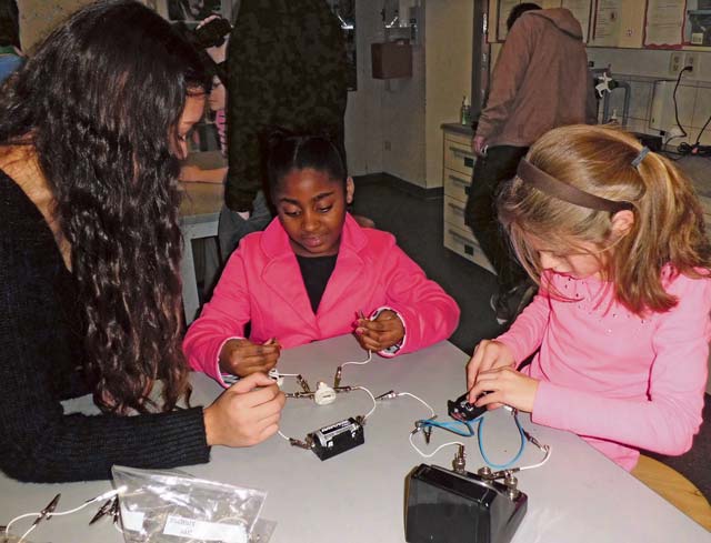 Photo by Lynnie RichardsonStudents build and test electrical circuits.