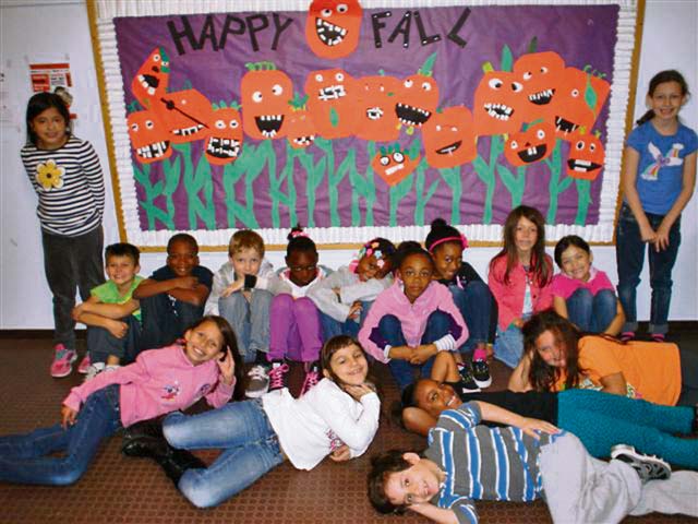 Photo by Pamela LehmannHappy fall!Second graders from Baumholder’s Wetzel Elementary School send happy fall greetings to students in the KMC.
