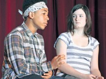 Photo by Elizabeth Behring“Chuck,” played by Daniel Estrada, tries to convince “Michelle,” played by Caitlin Akers, that an easy way to deal with difficult problems – instead of working them out by talking or other healthy ways – is to take drugs. The eighth-graders performed the play “Choices” Oct. 25 at Kaiserslautern Middle School on Vogelweh. The show, directed by drama, business and study skills teacher Iris Abbott and assisted by Adolescent Substance Abuse counselor Nick Seri, was the final event for the school’s anti-drug “Spirit Week,” which supported the Army’s Red Ribbon Week.