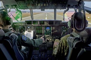 Capt. April Brown, 37th Airlift Squadron instructor pilot, and 1st Lt. Christopher Ansel, 40th AS co-pilot, land a C-130J Super Hercules.
