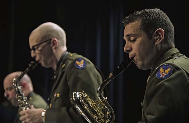 Staff Sgt. Lencys Esteban-Nunez, regional saxophonist for the U.S. Air Forces in Europe Band, plays a song during a Battle of the Bulge 70th anniversary commemoration event.