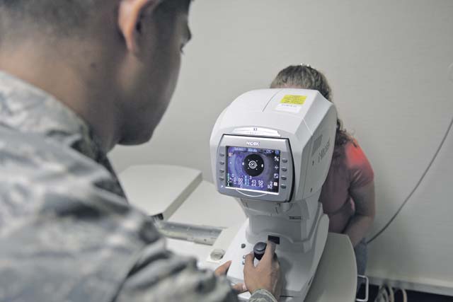 Senior Airman Lloydon Balili, 86th Aerospace Medicine Squadron ophthalmic technician, uses an auto-refractor to determine a patient’s baseline prescription Sept. 30 on Ramstein. As U.S. Air Forces in Europe’s largest optometry clinic, they treat ID cardholders for anything from retraining physicals to school screenings.