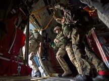 Photo by Senior Airman Damon KasbergParatroopers jump out of a U.S. Air Force C-130J Super Hercules assigned to the 37th Airlift Squadron Sept. 20, 2014, over Eindhoven, the Netherlands. Paratroopers from eight nations came to the Netherlands to re-enact the jumps made during Operation Market Garden 70 years ago. The commemoration was held to honor those who died to liberate the Netherlands.