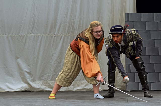 Photo by Alyse DeSelms‘I Hate Shakespeare’Ramstein High School seniors Sofia Dinges and Rakim Cephus train how to properly fence with their rapiers during rehearsal for the upcoming play, “I Hate Shakespeare.” Showings will be held at 7 p.m. today and Saturday.