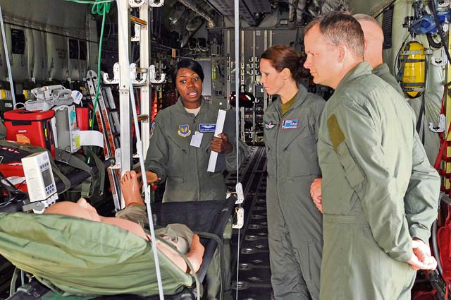 Staff Sgt. Ieshia Pledger, 86th Aeromedical Evacuation Squadron AE specialist, explains the equipment and procedures for AE missions to  members of the Norwegian medical branch during a tour Oct. 3 on Ramstein. The medical branch visited the Contingency Aeromedical Staging Facility, Landstuhl Regional Medical Center and other medical agencies to learn how the U.S. performs aeromedical evacuation and critical care aeromedical transport missions.