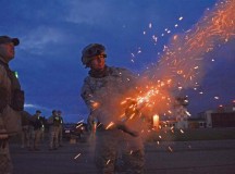 Airman 1st Class David Vasquez, 355th Security Forces Squadron Creek Defender course trainee, fires a slap flare during a night combat tactics class Tuesday in Baumholder. Vasquez was part of a 98-student class that underwent training to prepare them for deployed conditions around the world.