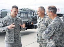 Photo by 1st Lt. Nicole MancosMaj. Gen. Frederick H.  Martin (center), U.S. Air Force Expeditionary Center commander, and EC Command Chief Master Sgt. Pete Stone (right) discuss the aerial port operations with Master Sgt. Justin Hemken, 721st Aerial Port Squadron NCO in charge of ramp services. The 721st APS provides passenger services for the 521st Air Mobility Operations Wing to expedite warfighting and humanitarian missions throughout Europe, the Middle East and Africa.