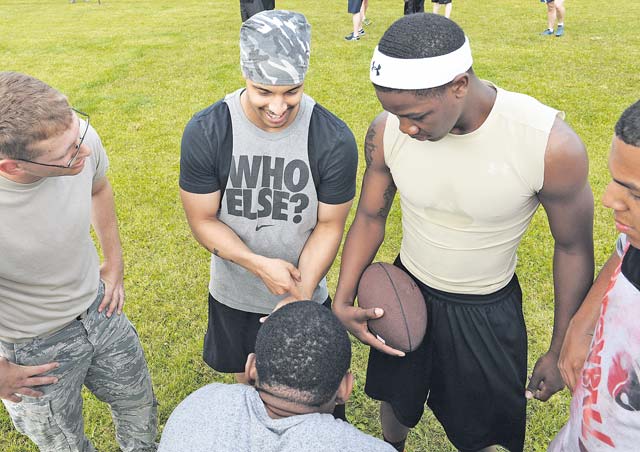 Photo by Airman 1st Class Michael StuartPeople gather to play football during Resiliency Day June 19 on Ramstein. The day allowed the members of the 86th Airlift Wing to get out and meet new people as well as build teams and working relationships. 