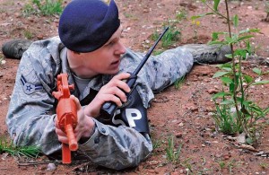 Airman 1st Class Scott Dillon,  569th U.S. Forces Police Squadron patrolman, provides security during a training exercise May 30 on Ramstein. The training gave security forces members the ability to practice life-saving techniques and gave medics the opportunity to train in a realistic combat situation.