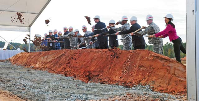 Photo by Sgt. Daniel ColeSenior U.S. military leaders, German dignitaries and former wounded U.S. service members turn the first shovels of earth Oct. 24 to mark the start of construction of the Rhine Ordnance Barracks Medical Center that will replace Landstuhl Regional Medical Center and the Ramstein Air Base Clinic.