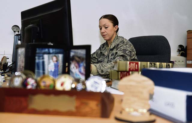 Tech. Sgt. Holly Bambarger, 86th Airlift Wing Judge Advocate paralegal, completes a will for a Ramstein member Nov. 25 on Ramstein. Bambarger recently won the Air Force Outstanding Paralegal NCO of the Year for her accomplishments, demonstrating superior initiative, technical skills, leadership, attorney/paralegal teaming, and devotion to duty at home station and overseas locations.