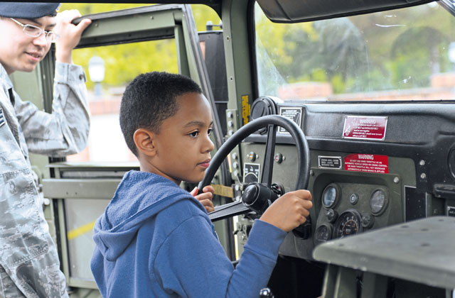 Tye Jones, son of Tech. Sgt. Shawn Jones, commander’s support staff NCOIC, 86th Security Forces Squadron, sits in the driver’s seat of a Humvee.