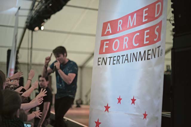 American musician Sean Foreman performs on stage during a free concert hosted by Armed Forces Entertainment April 25 on Ramstein. Foreman is a member of 3OH!3, an American electronic musical duo from Boulder, Colo. The duo spent time at the USO Warrior Center interacting with wounded warriors before they performed for Airmen and their families.