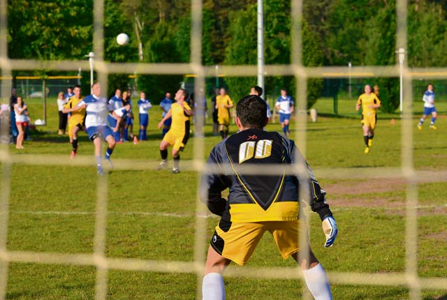 Photo by Airman 1st Class Jordan CastelanAirmen from the 37th Airlift Squadron and the 603rd Air and Space Communications Squadron attempt to make a play on the ball June 5 on Ramstein. Squadrons around base competed during the intramural soccer season.