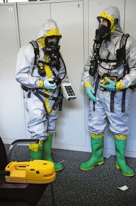 Airman 1st Class Eric Roberts (left), 86th Aerospace Medical Squadron bioenvironmental engineering journeyman, and Airman 1st Class Eric Welsh, 786th Civil Engineer Squadron emergency management journeyman, survey a crime scene.