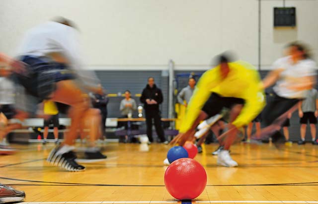 Airmen from the 86th Mission Support Group participate in a competitive game of dodge ball during the 2013 Mission Support Group Sports Day Sept. 18 on Ramstein. Airmen took time to focus on the physical and social core concepts.