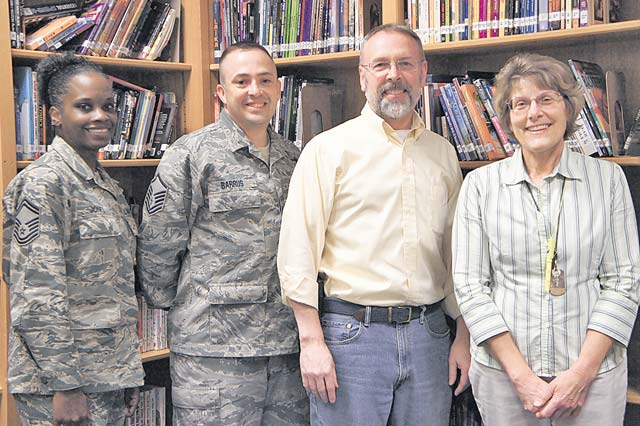 Photo by Pat KieblerRepresenting the parents, students and teachers at Ramstein Middle School for school year 2014-15 are the newly elected members of the executive board: (from left) Senior Master Sgt. Brandi Jones (first vice president), Master Sgt. James Barrus (president), Donald Seltzer (parliamentarian) and Janet Priddy (treasurer). Not pictured are Lorraine Gonzales (second vice president) and Laura McGann (secretary). If you are looking to volunteer in your child’s school — or want to volunteer in the community because you don’t have children — consider joining the RMS PTSA. Volunteer positions of all kinds are available. For more information, email ptsa.rms@gmail.com.