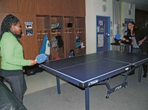 Tameka Grant enjoys a game of ping-pong with one of her youths Oct. 17 at the Sembach Youth Center on Sembach Kaserne.