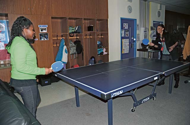  Tameka Grant enjoys a game of ping-pong with one of her youths Oct. 17 at the Sembach Youth Center on Sembach Kaserne.