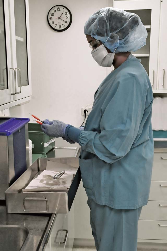 Airman 1st Class Abiyah Simmons, 86th Dental Squadron dental assistant, cleans dental instruments. Simmons is part of a multi-step process that includes sanitizing and packaging the instruments.