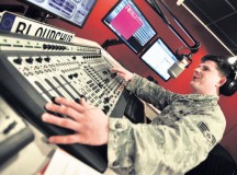 Photo by Senior Airman Aaron-Forrest WainwrightSenior Airman Shane Mitchell, American Forces Network Kaiserslautern radio disc jockey, plays the latest hits over the radio Sept. 6 on Vogelweh. AFN Kaiserslautern is celebrating 70 years of service to the KMC this year.
