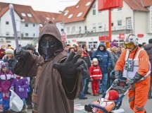 Photo by Airman 1st Class Jordan CastelanIndividuals in creative costumes and walking groups walk in the Fasching parade in Ramstein-Miesenbach.