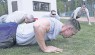 Members of Team Ramstein compete in the push-up challenge during the Air Force Assistance Fund Sports Day.