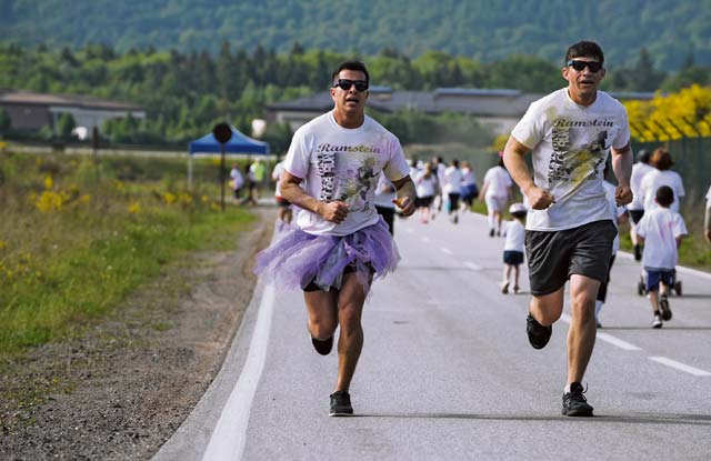 Members of Team Ramstein run during the Keystone Color Run on Ramstein.