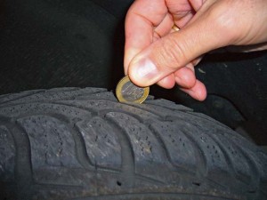 To check your tires’ tread depth, stick a euro coin into the tread. If the golden edge remains visible, your tire is worn down and it’s time to purchase a new tire.
