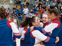 Members of the Ramstein Royals cheer squad celebrate after winning first place in the Division I 2014 Cheer Competition. The Royals have earned first place two years in a row.
