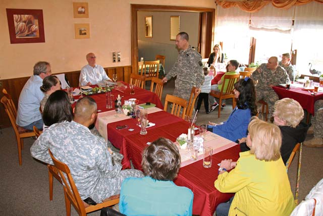 Photo by Bernd “Bernie” Mai German and American community members listen to Herbert Grimm’s accounts of his time as a German paratrooper during World War II at the weekly Stammtisch in Baumholder. The Stammtisch features a special guest once a month and everyone is welcome to attend. The group meets at 6 p.m. Wednesdays.