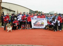 Photos by Airman 1st Class Holly Cook
Members of the KMC Eagles hockey team pose for a group photo before the start of the second annual Airman 1st Class Zachary Ryan Cuddeback Memorial 5K March 2 on Ramstein.