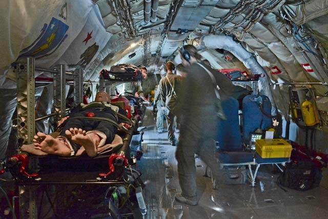Airmen from the 86th Aeromedical Evacuation Squadron on Ramstein secure their medical equipment on a KC-135 Stratotanker over Germany. The crew performed an in-flight emergency and went over several scenarios and tanker statistics to help them prepare for future operations on the KC-135.
