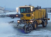Courtesy photoThe 786th Civil Engineer Squadron snow removal team removes snow on a parking apron during the 2012-2013 snow season.