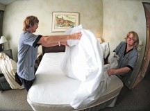 Waltraud Arnold (left) and Ute Spang, Air Force Inns housekeepers, work together to change the sheets in a hotel room. The Air Force Inns housekeepers’ mission is to provide quality facilities and service to lodging guests.