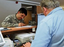 Photo by Airman 1st Class Holly MansfieldCharles Pittenturf, 86th Force Support Squadron value added tax clerk, helps Airman 1st Class Michael Ortiz, 86th Comptroller Squadron customer service technician, complete a VAT form Aug. 29 on Ramstein. The VAT office provides tax relief opportunities for members and their families stationed in Germany.