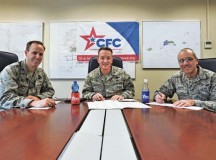 Photo by Senior Airman Aaron-Forrest WainwrightBrig. Gen. Patrick X. Mordente (center), 86th Airlift Wing commander, Col. Leslie Smith (left), 86th AW vice commander, and Chief Master Sgt. James Morris (right), 86th AW command chief, pose for a photo before donating to the Combined Federal Campaign Sept. 18 on Ramstein. The mission of the CFC is to promote and support philanthropy through a program that is employee focused, cost-efficient and effective in providing all federal employees the opportunity to improve their quality of life.