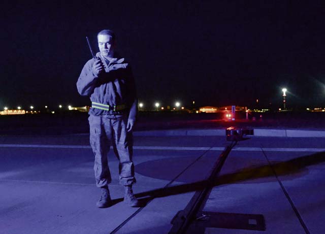 Senior Airman Quinn Carli, 86th Operations Support Squadron airfield management operations coordinator, reports a  discrepancy in the aircraft arresting system Feb. 18 on Ramstein. Any and all discrepancies that haven’t already been documented are reported to the appropriate agencies during routine airfield inspections.