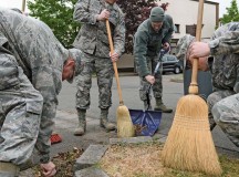 Airmen from the 86th Communications Squadron ensure the streets surrounding their squadron are spotless during Base Pride Day April 28 on Ramstein. Base Pride Day is a semiannual, two-day spring cleanup when Airmen clean where they live and work.