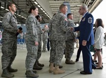Airmen, family and friends congratulate Chief Master Sgt. James A. Morris, 86th Airlift Wing command chief, at the end of his retirement ceremony May 23 on Ramstein. Morris retired after 28 years of service.