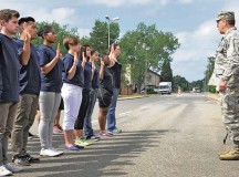 Brig. Gen. John Horner, Joint Base San Antonio-Randolph, Texas Air Force recruiting service commander, makes an appearance at the swear-in for delayed entry program members June 12 on Ramstein. The delayed entry program members had the opportunity to speak to a leader about the Air Force.